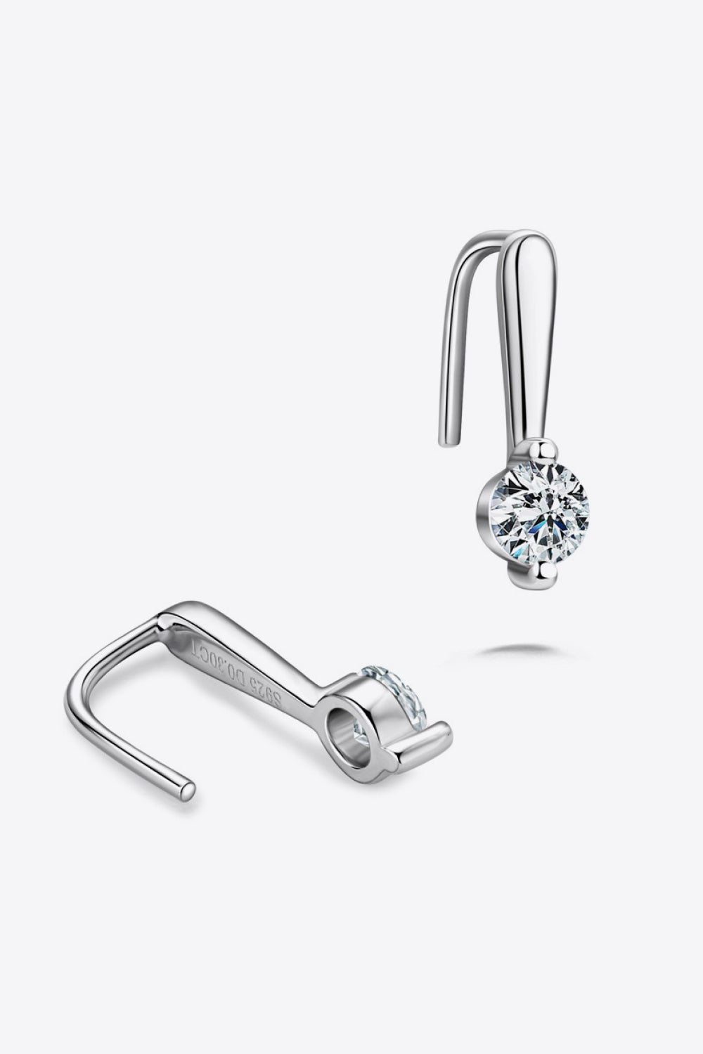 Polished 925 sterling silver moissanite earrings feature round brilliant stones in slim curved drop-hook settings.