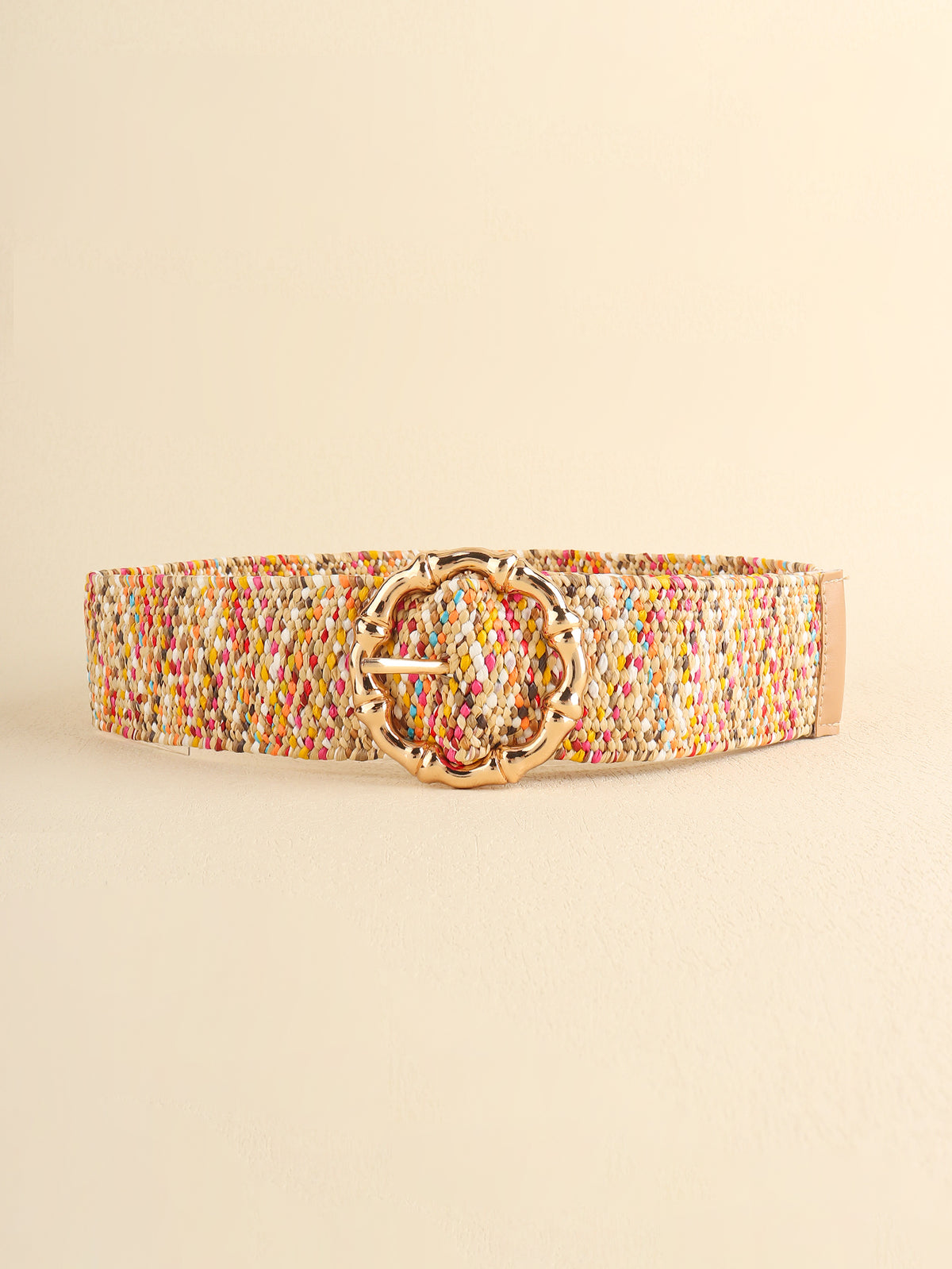 Multicolored wide woven belt with warm neutral tones and bright accents, featuring a textured polyester surface and rounded decorative alloy buckle.
