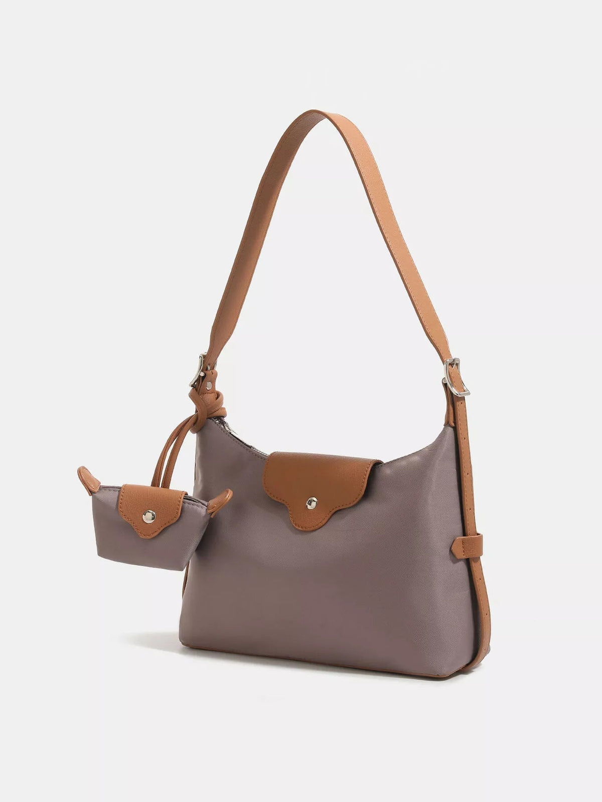 Taupe nylon hobo shoulder bag with brown trim, a curved silhouette, adjustable shoulder strap, snap-flap closure, and matching coin purse.