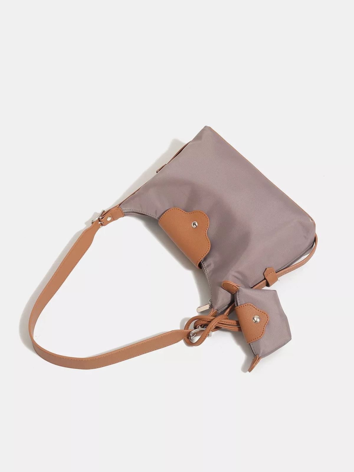 Medium taupe nylon hobo shoulder bag with a slouchy silhouette, tan leather trim and strap, zipper closure, and an attached matching coin purse.