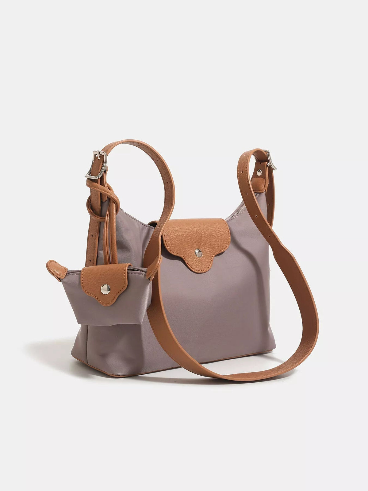 Medium taupe nylon hobo shoulder bag with tan trim, long adjustable strap, snap-tab closure, and matching attached coin purse.