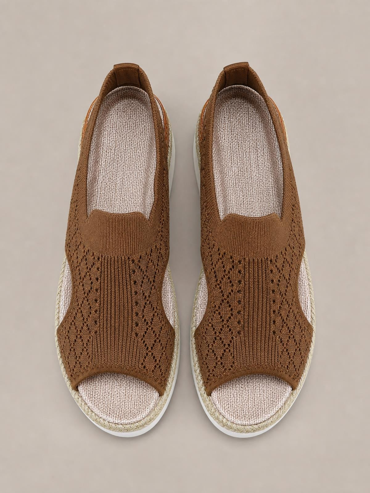 Brown mesh open toe platform wedge sandals feature patterned uppers, light woven trim, cushioned footbeds, and mid-height wedge soles.