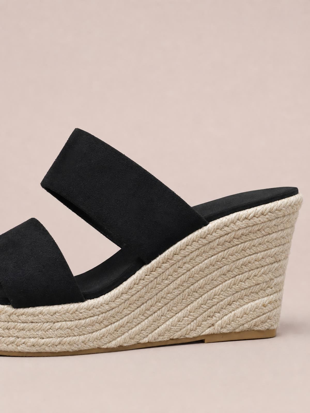 Black suede open-toe platform wedge sandal with wide straps and a mid-height braided espadrille-style wedge sole.