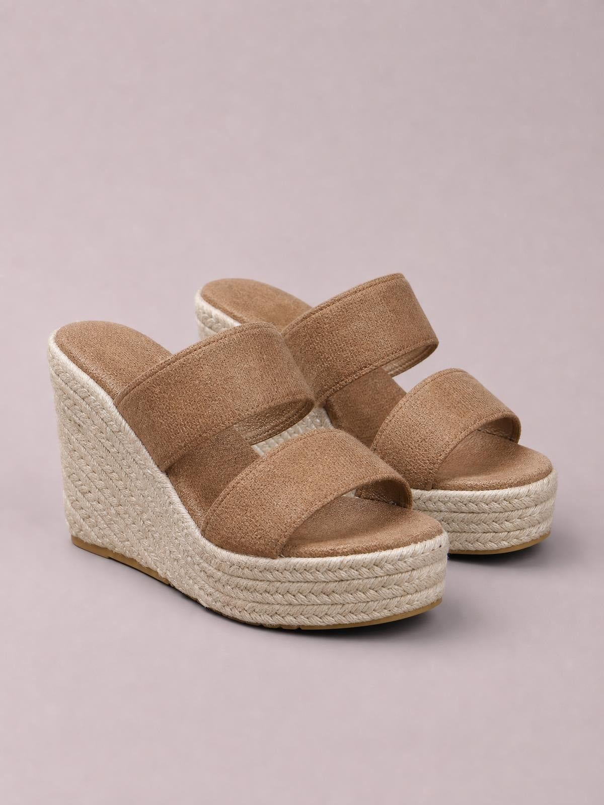 Tan suede open toe platform wedge sandals with wide crossover straps and braided espadrille-style mid heels.