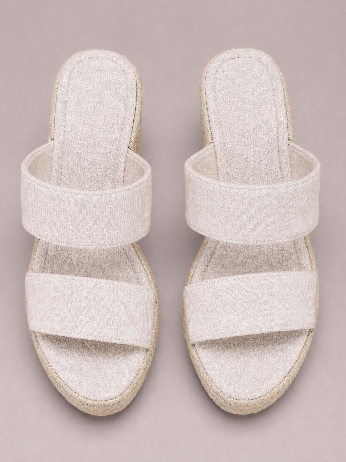 Cream open toe platform wedge sandals with wide double straps, cushioned footbeds, and braided espadrille-style trim shown from above.