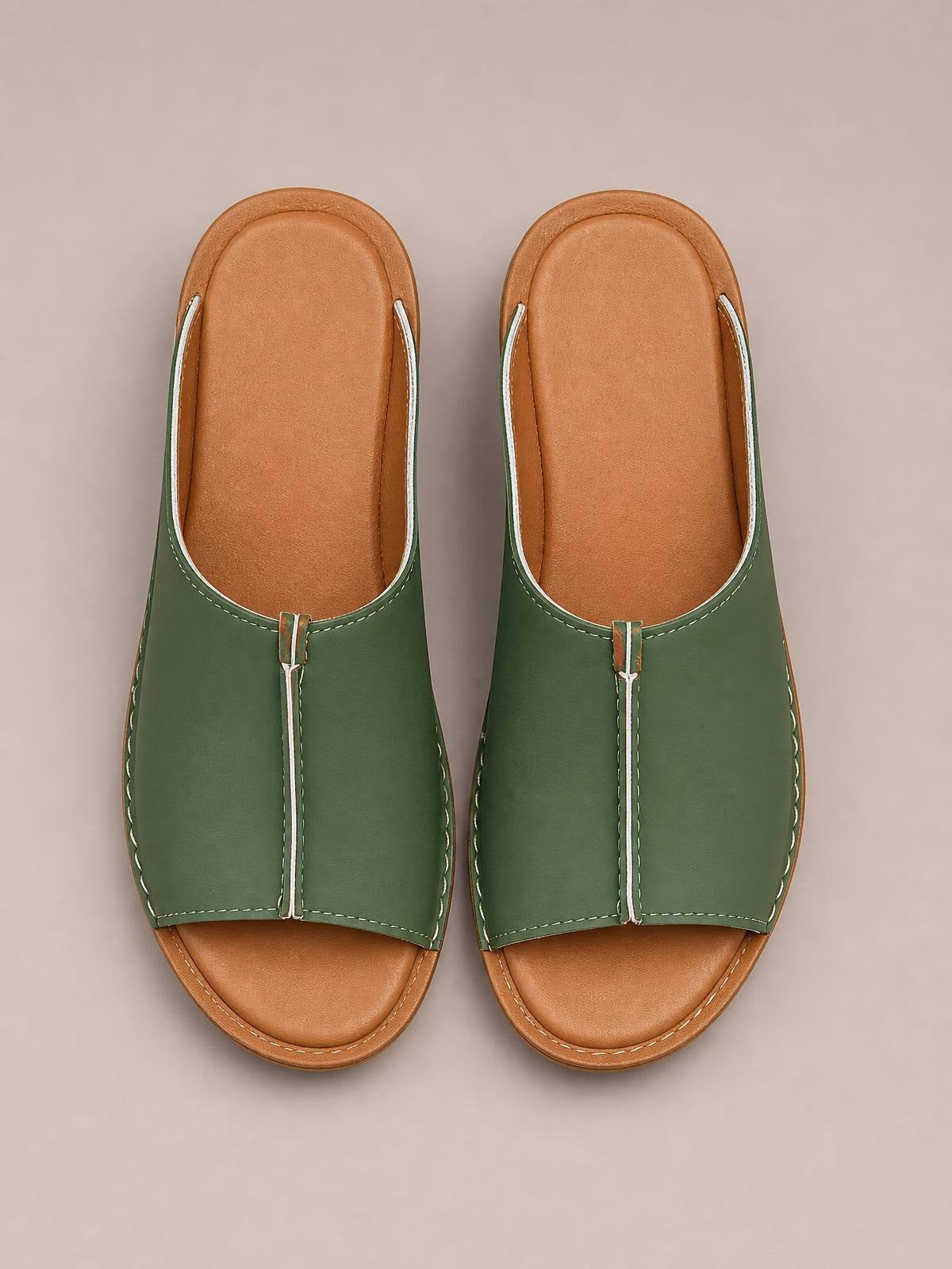 Green open-toe wedge sandals with wide olive PU uppers, tan cushioned footbeds, contrast stitching, and a low wedge sole.
