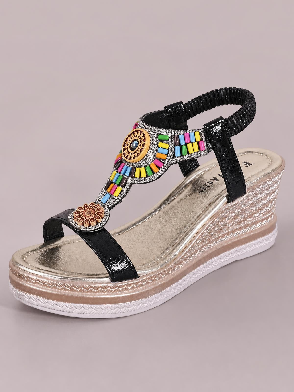 Black open toe wedge sandals with jeweled multicolor beaded straps, ankle loop, and a textured mid-height platform wedge sole.