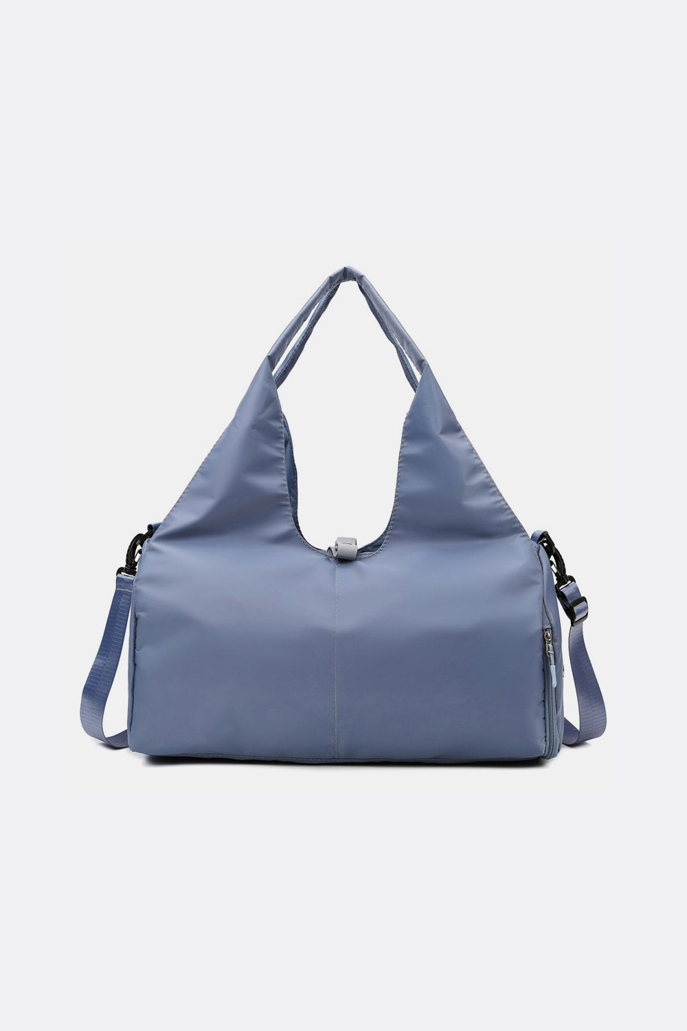 Large blue Oxford cloth waterproof travel bag with a broad soft-structured silhouette, dual top handles, long shoulder strap, and side zip pocket.