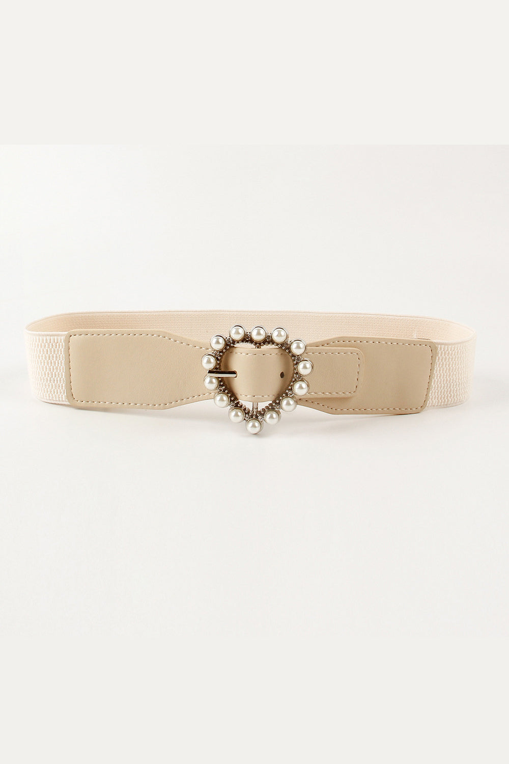 Beige elastic belt with stitched PU detailing and a softly rounded heart-shaped buckle framed by pearl-like accents.