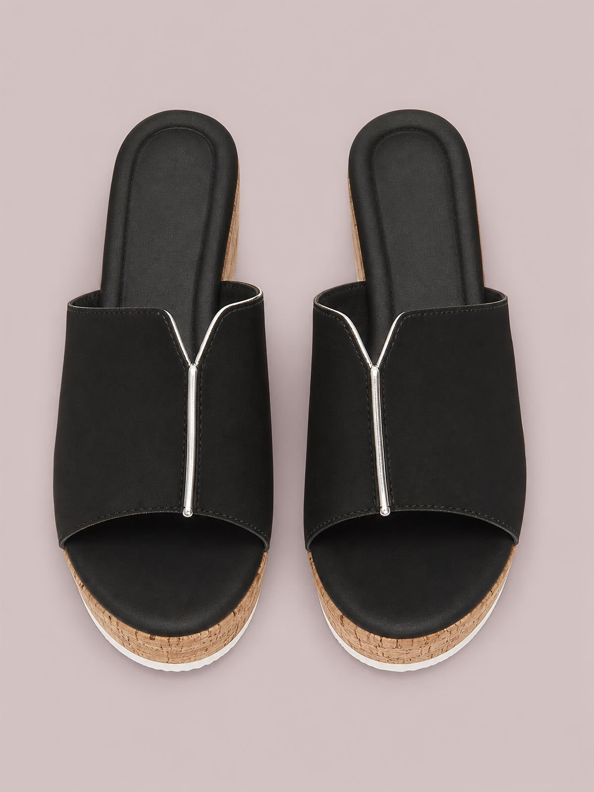Black peep toe high heel sandals with wide slip-on uppers, silver-tone center trim, cushioned footbeds, and cork-textured platform soles.