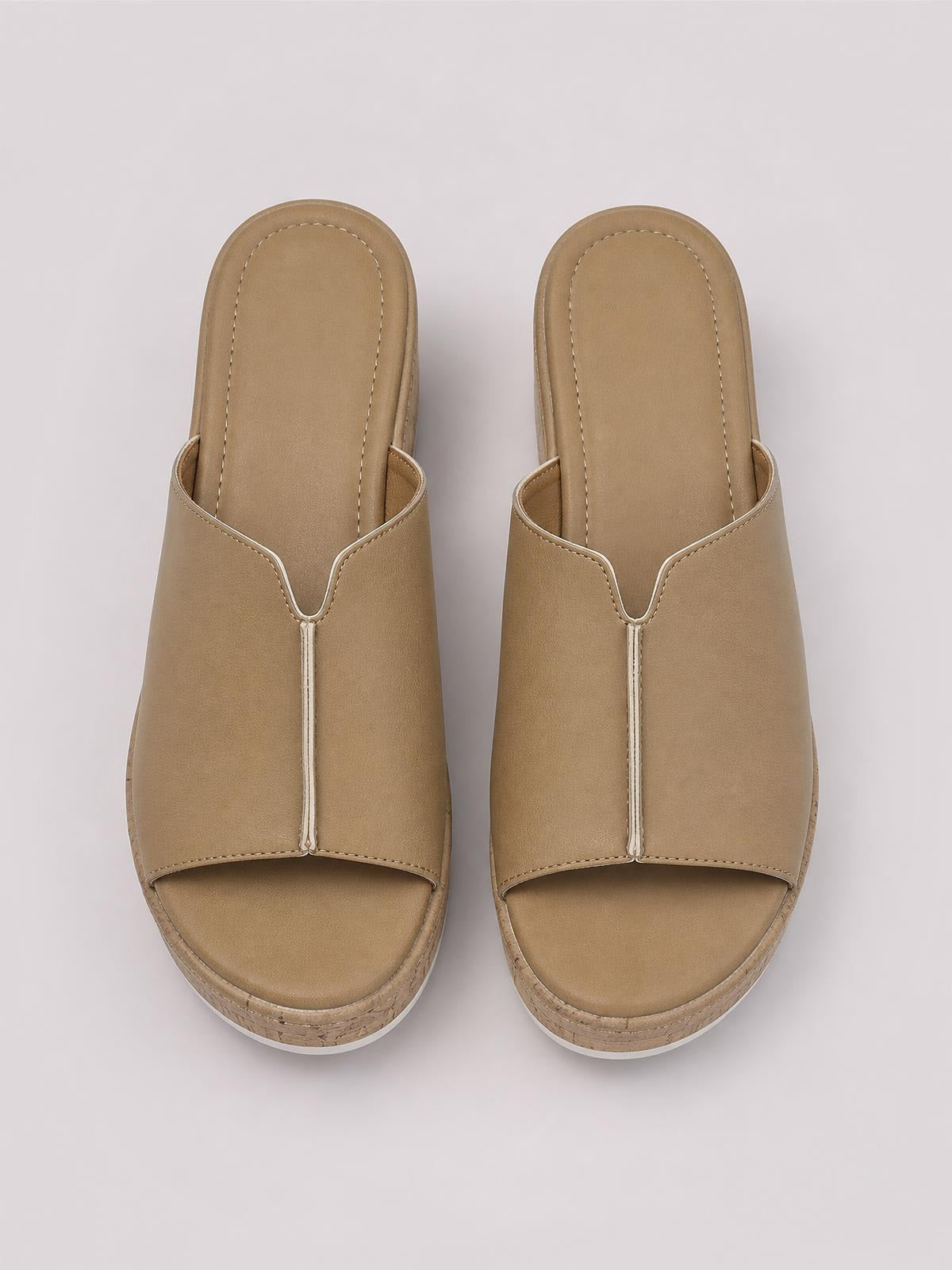 Tan peep-toe high heel sandals with wide front straps, center seam detailing, contrast stitching, cushioned footbeds, and elevated textured soles.