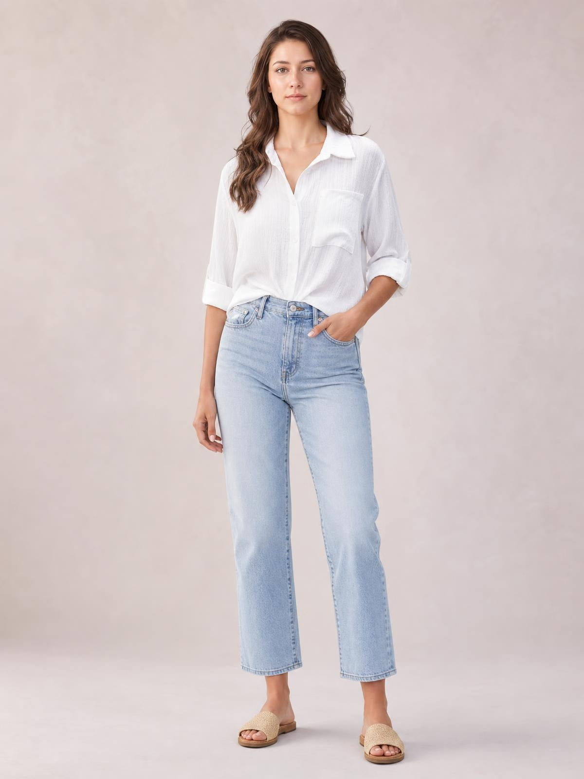 A model wears a white solid collared shirt with rolled three-quarter sleeves, chest pocket, relaxed regular silhouette, and a visible twisted front detail.