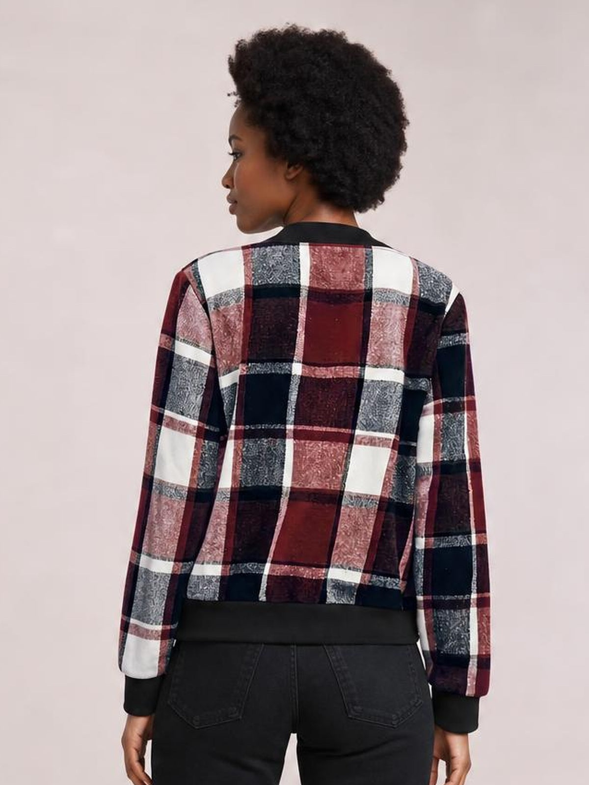 Model shown from the back in a plaid baseball collar zip-up jacket with burgundy, black, white, and gray blocks, long sleeves, and black ribbed trim.