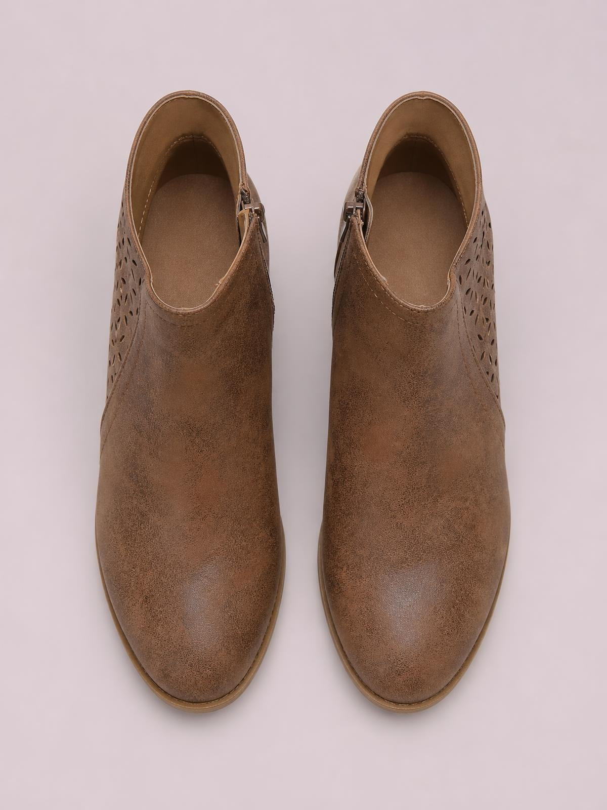 Brown PU leather point-toe ankle boots with perforated side panels and mid block heels, shown from above.