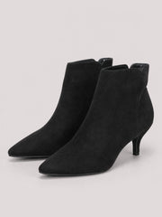 Black suede point-toe ankle boots with a sleek silhouette, smooth construction, and slim kitten heels.