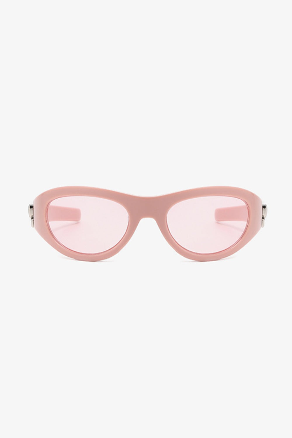 Pink polycarbonate cat-eye sunglasses feature rounded lenses, softly upswept corners, a streamlined bridge, and subtle silver side detailing.