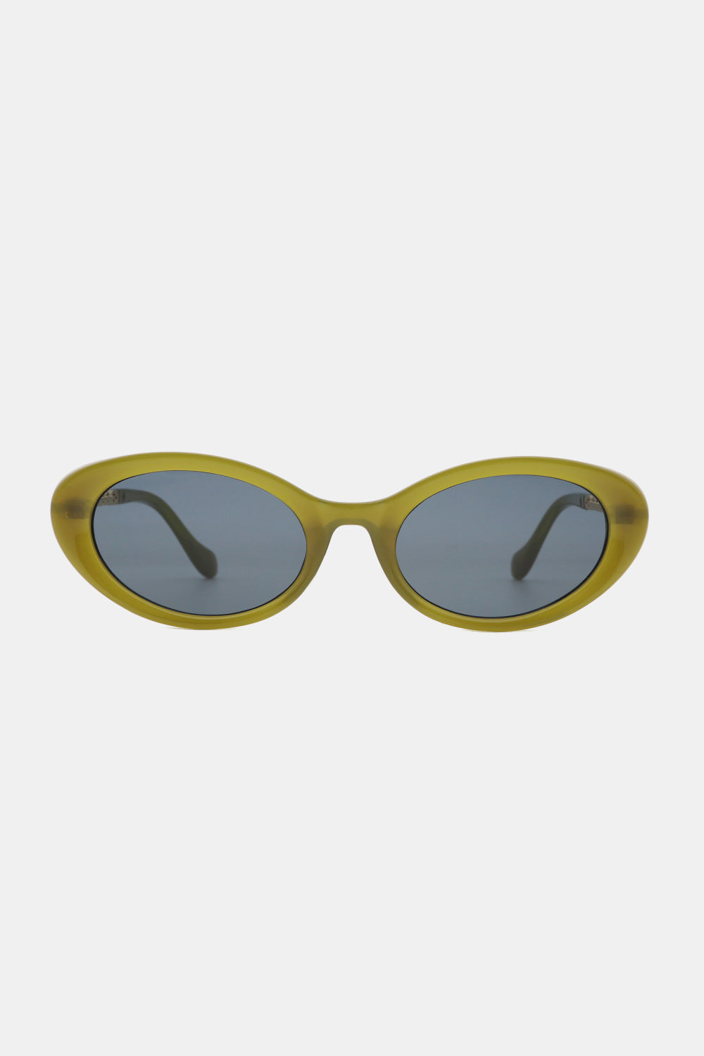 Olive-green polycarbonate cat-eye sunglasses feature a softly upswept oval silhouette, rounded blue-gray lenses, and dark metal-plastic hybrid temples.