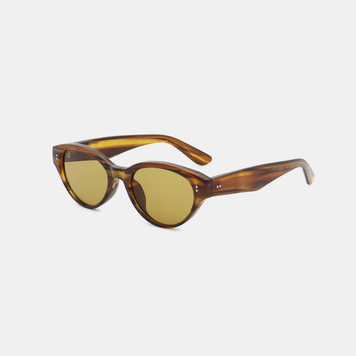 Brown tortoiseshell-style polycarbonate cat-eye sunglasses feature rounded, softly upswept frames, slender temples, and warm tinted lenses.
