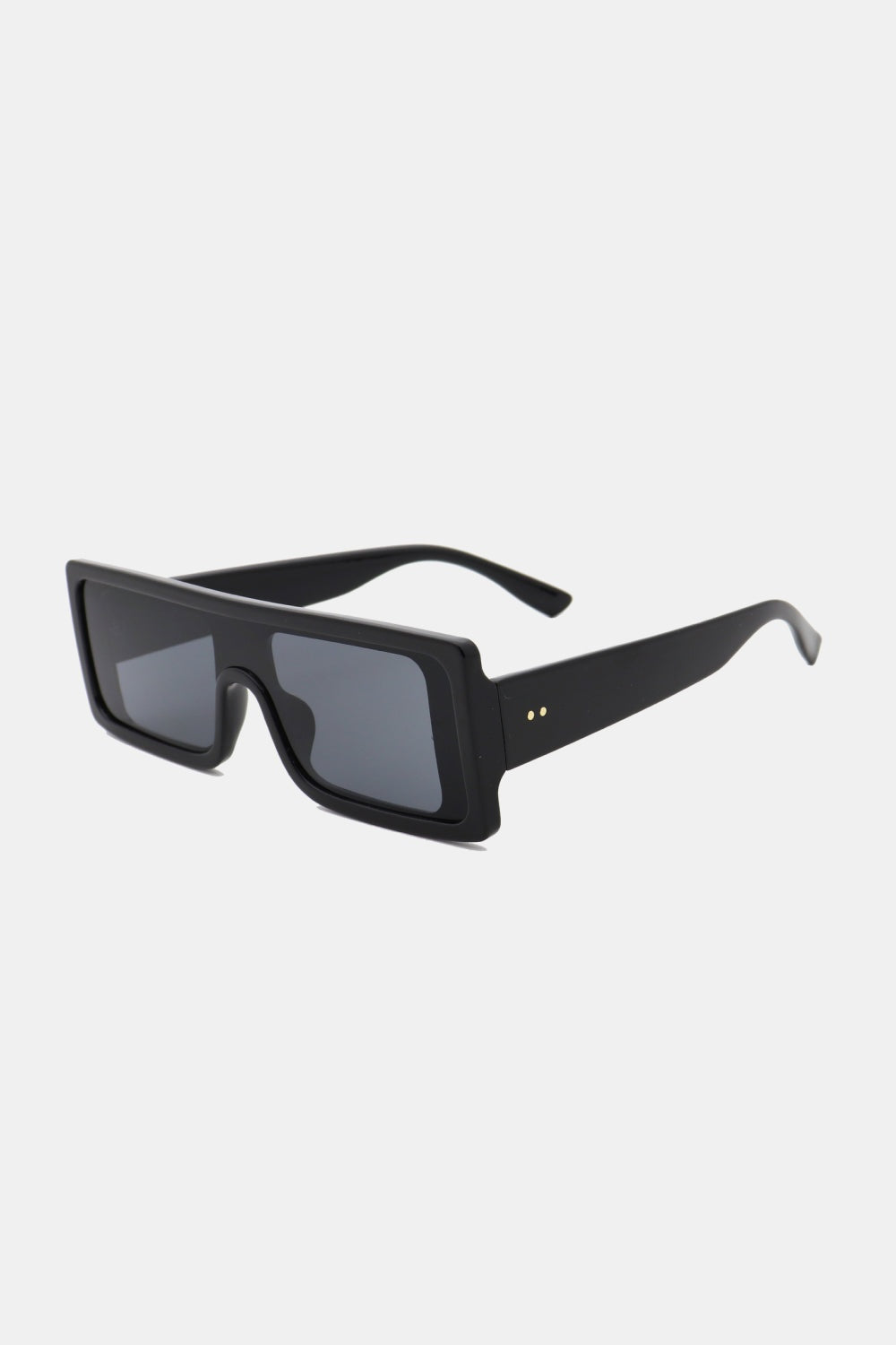Black polycarbonate rectangle sunglasses feature a broad, squared frame, dark lenses, and streamlined temples for a bold, modern silhouette.
