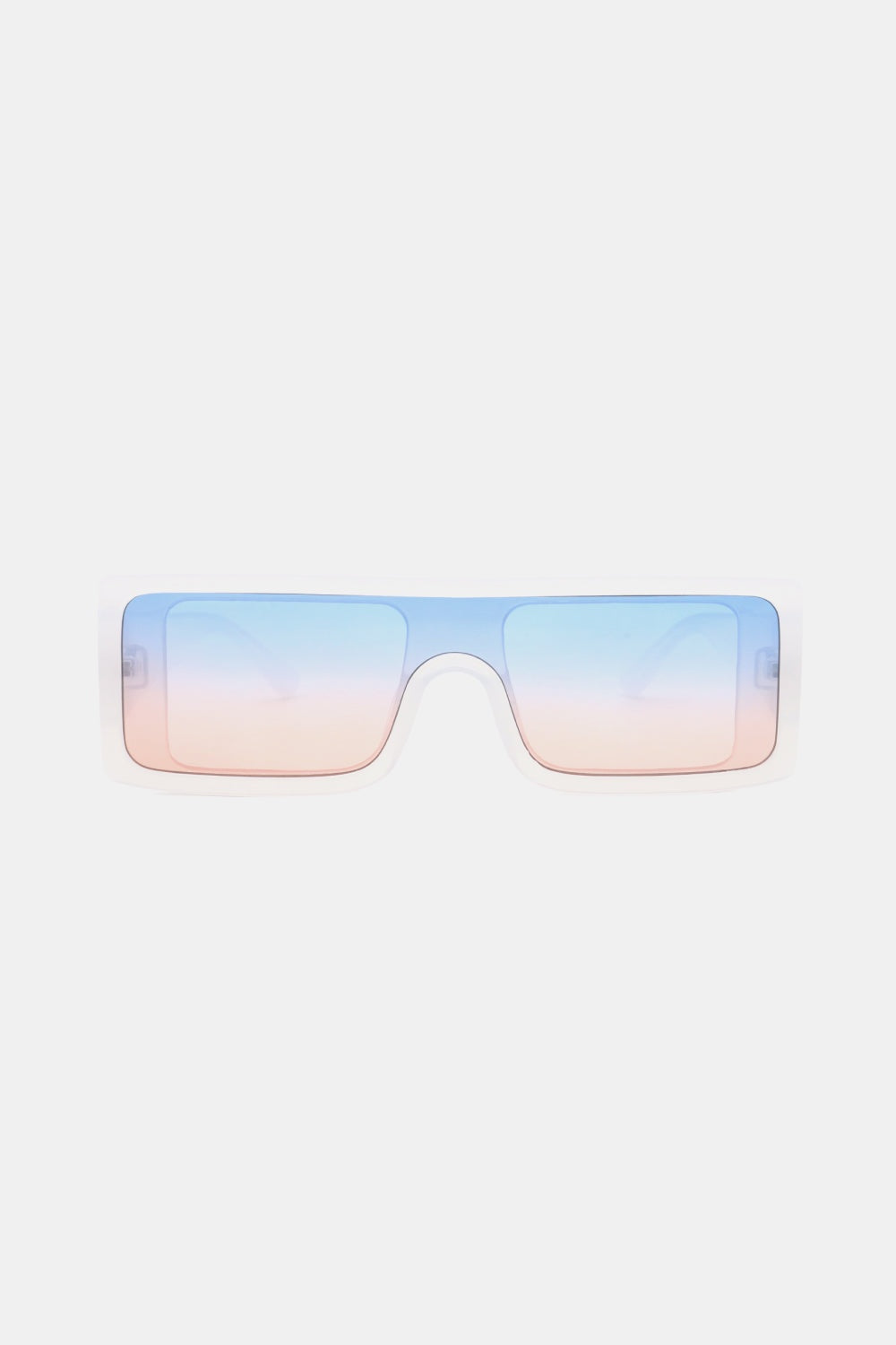 Translucent pale blue polycarbonate rectangle sunglasses feature a broad frame, squared lenses, and blue-to-pink gradient lenses for a modern statement silhouette.