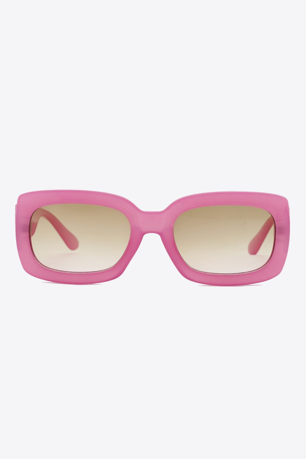 Bold pink polycarbonate rectangle sunglasses feature a substantial frame with softly rounded corners, wide temples, and lightly tinted lenses.