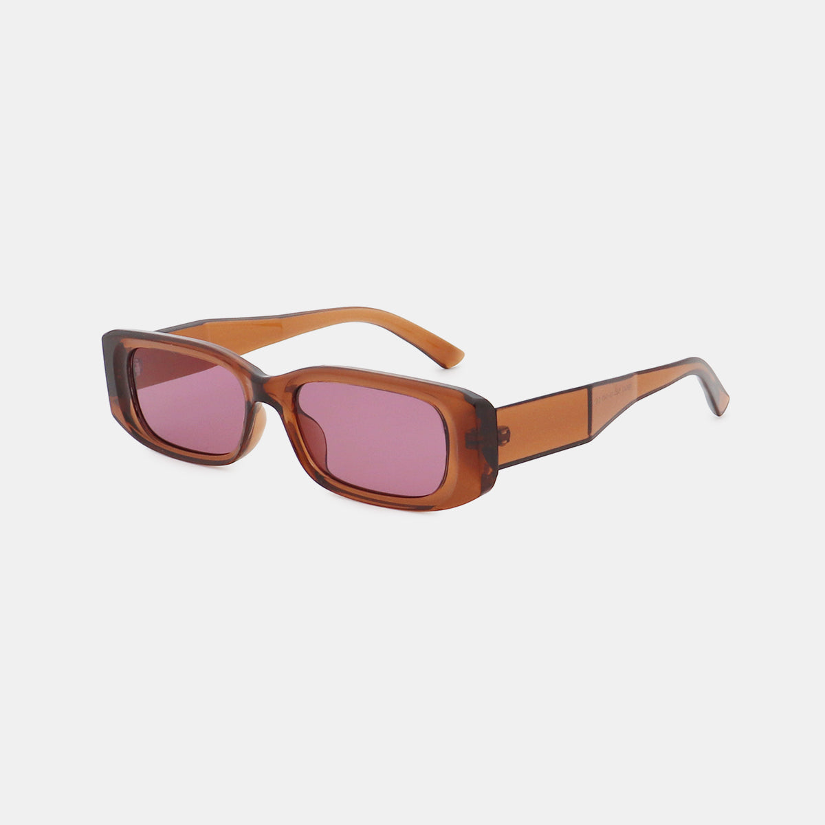 Translucent brown polycarbonate rectangle sunglasses feature broad squared frames, softly rounded corners, pink-tinted lenses, and wide temples in a sleek modern silhouette.
