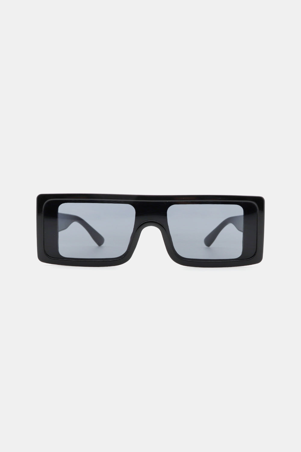 Black polycarbonate rectangle sunglasses feature a broad, structured front, squared lenses, and thick streamlined frames for a bold modern silhouette.