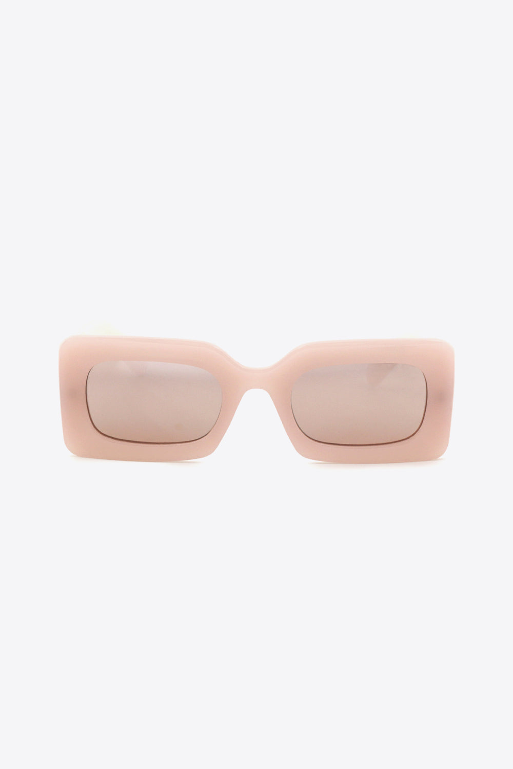 Pale pink polycarbonate rectangle sunglasses feature softly rounded tinted lenses and a substantial, sculptural frame for a bold modern silhouette.