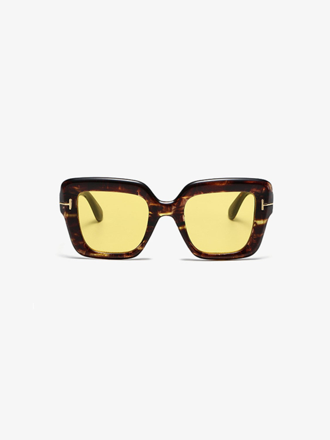 Square polycarbonate sunglasses feature a bold tortoiseshell frame, softly rounded edges, yellow lenses, broad temples, and subtle metal-look hinge accents.