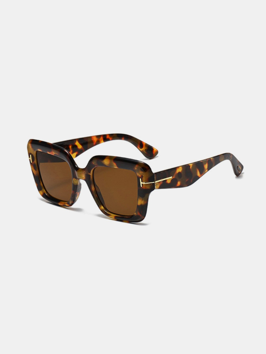 Tortoiseshell polycarbonate square sunglasses feature softly rounded frames, brown lenses, broad temples, and subtle metal-look hinge accents.