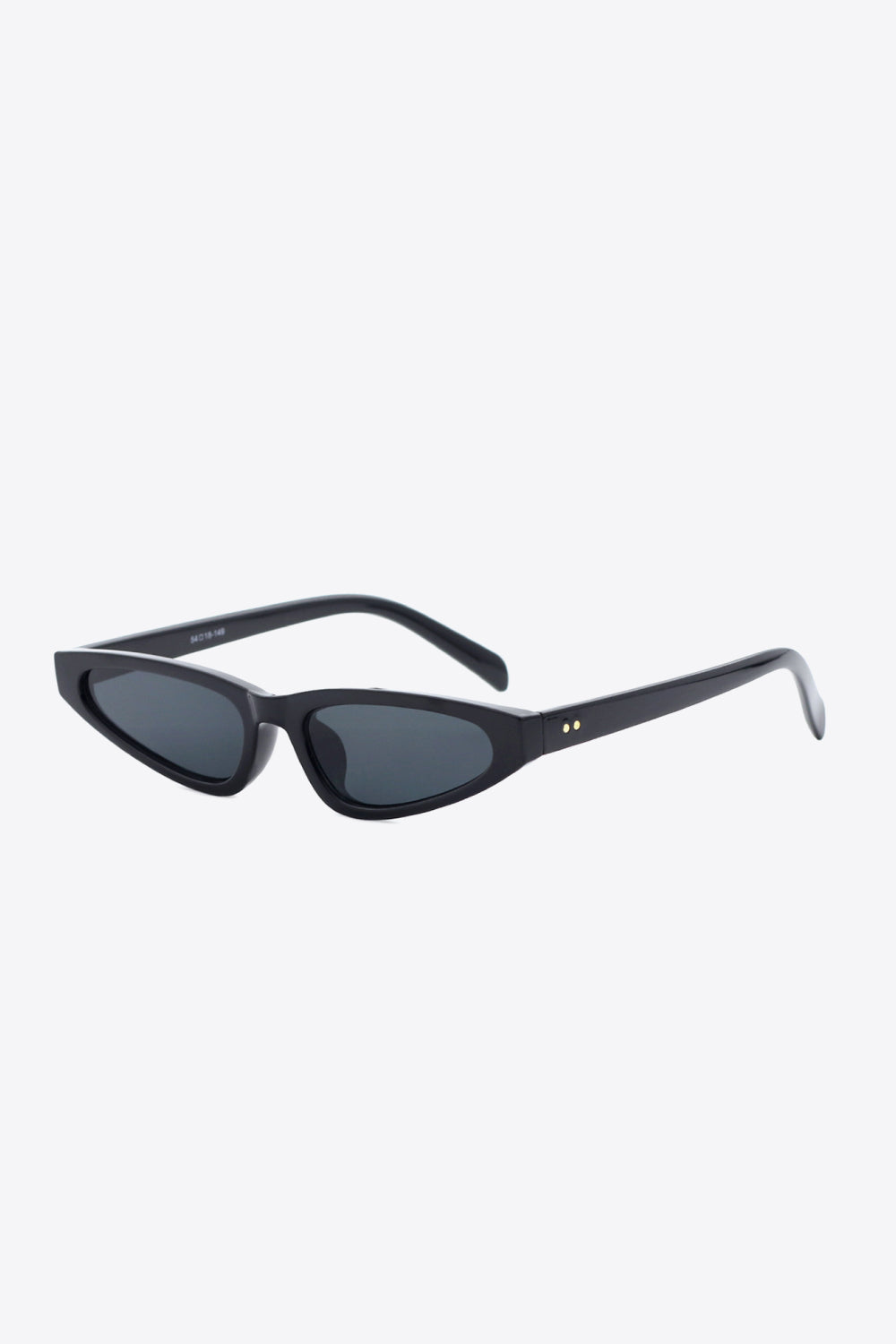 Black polycarbonate cat-eye sunglasses feature a gently upswept silhouette, dark acetate lenses, matching temples, and subtle gold rivet accents.