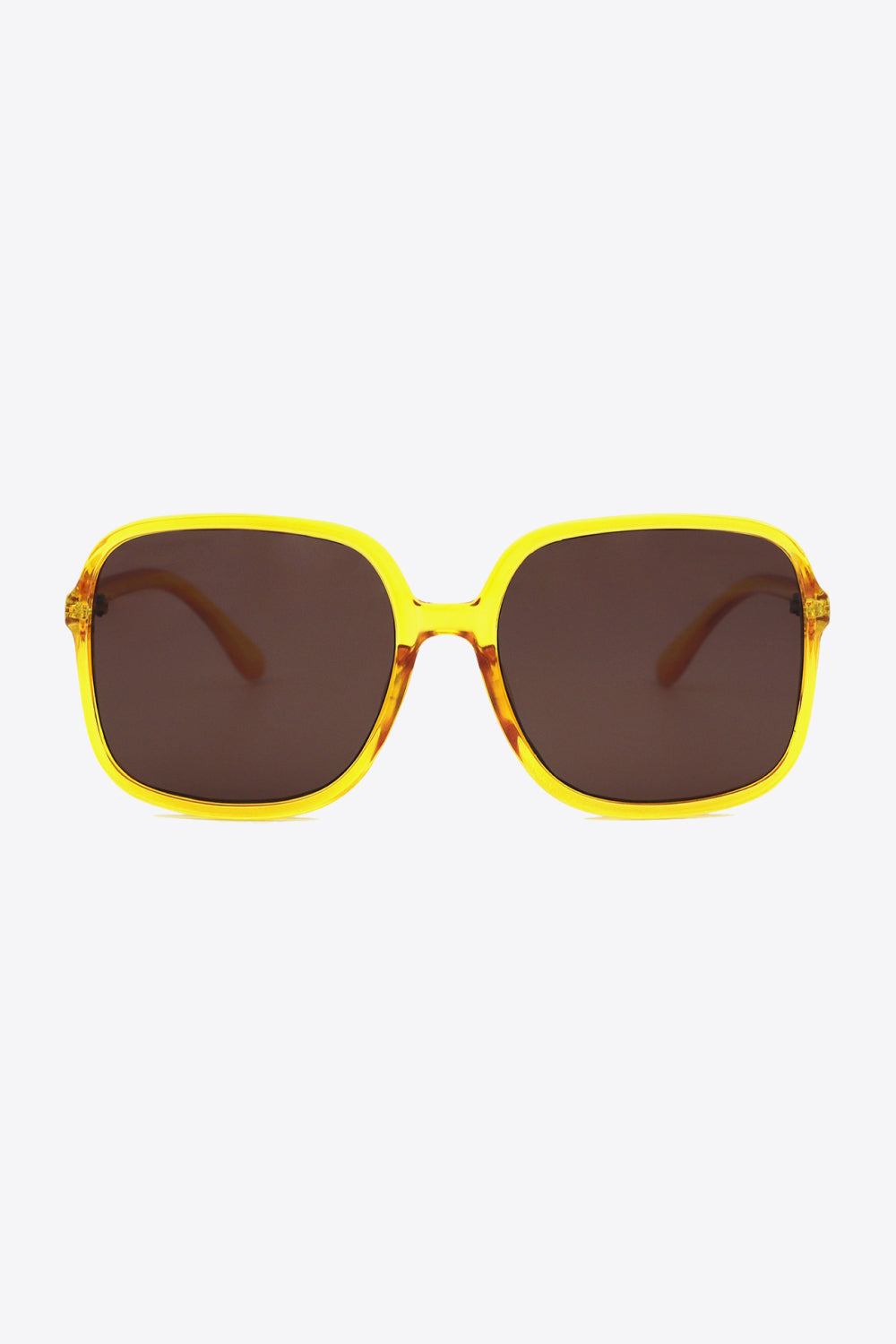 Bright yellow polycarbonate square sunglasses feature softly rounded frames, a defined top line, broad brown lenses, and sleek matching temples.