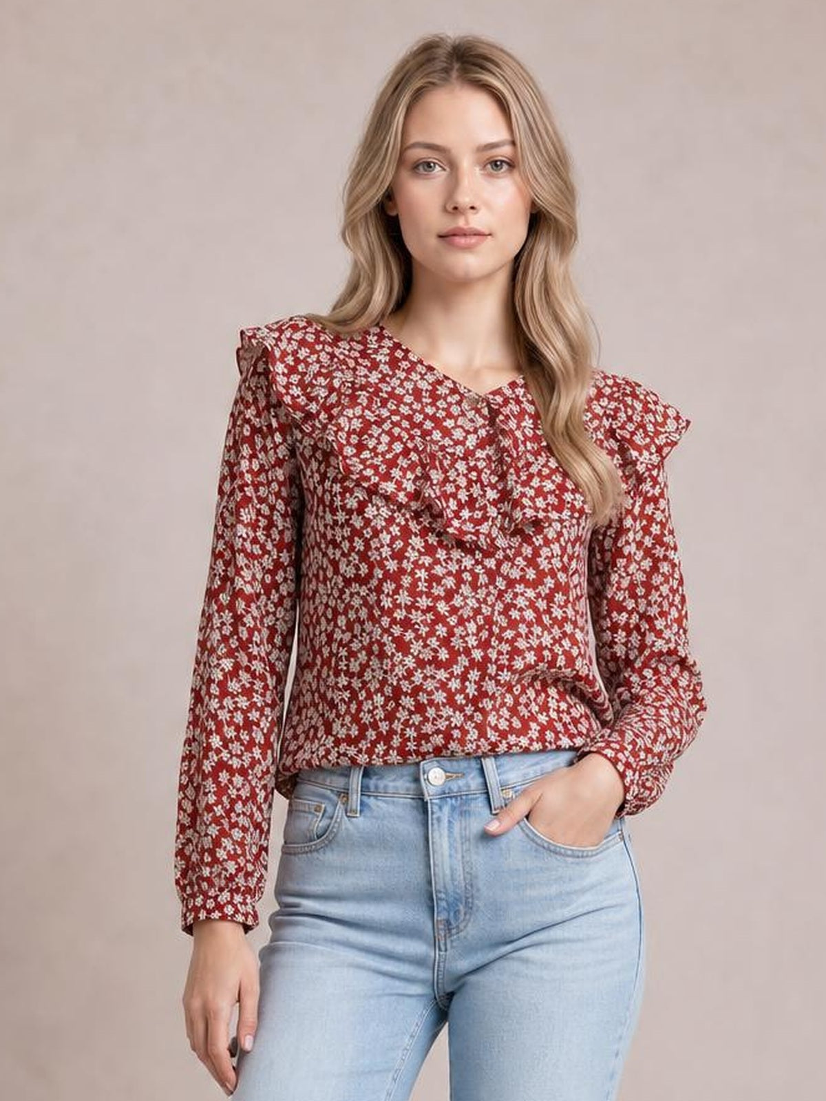A model poses in a red floral long-sleeve blouse with a statement ruffled collar, relaxed straight silhouette, and softly gathered shoulder details.