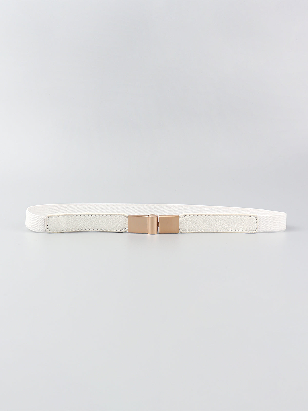 White PU elastic skinny belt with textured side panels, visible stitching, and a centered polished gold-tone alloy buckle.
