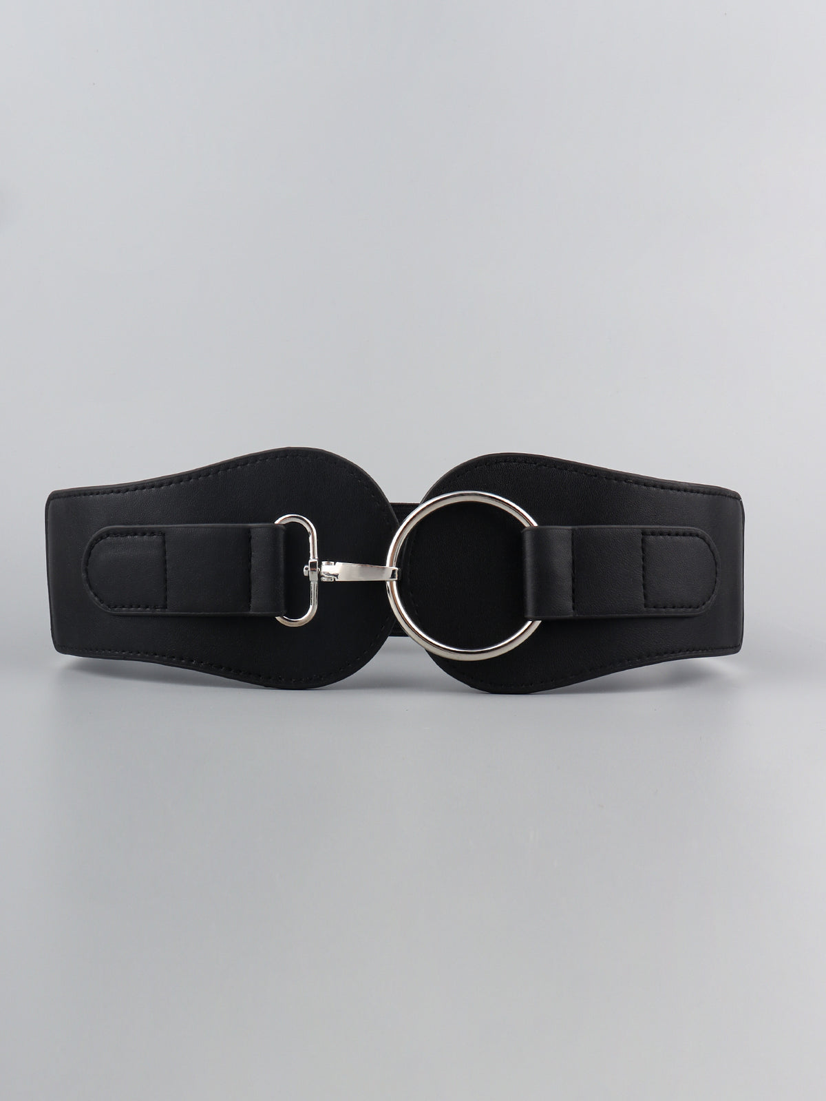 Wide black PU elastic belt with stitched edges and a large silver-tone alloy ring buckle, shown fastened in a structured, waist-defining silhouette.