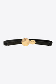 Slim black PU leather belt with stitched construction and a sculptural gold alloy buckle featuring two rounded, softly textured discs.