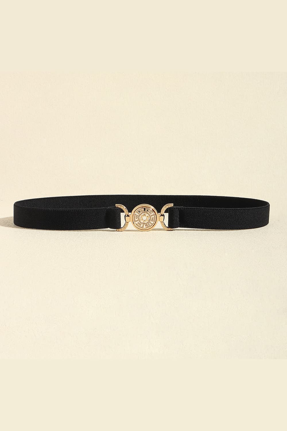 Black PU leather belt with a sleek 0.8-inch band and ornate gold-tone alloy circular buckle, shown flat to highlight its streamlined construction.