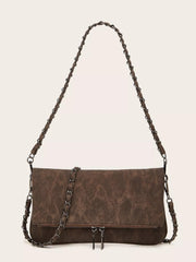 Medium brown PU leather shoulder bag with a structured rectangular silhouette, chain strap, front zip pocket, and dual zipper pulls.