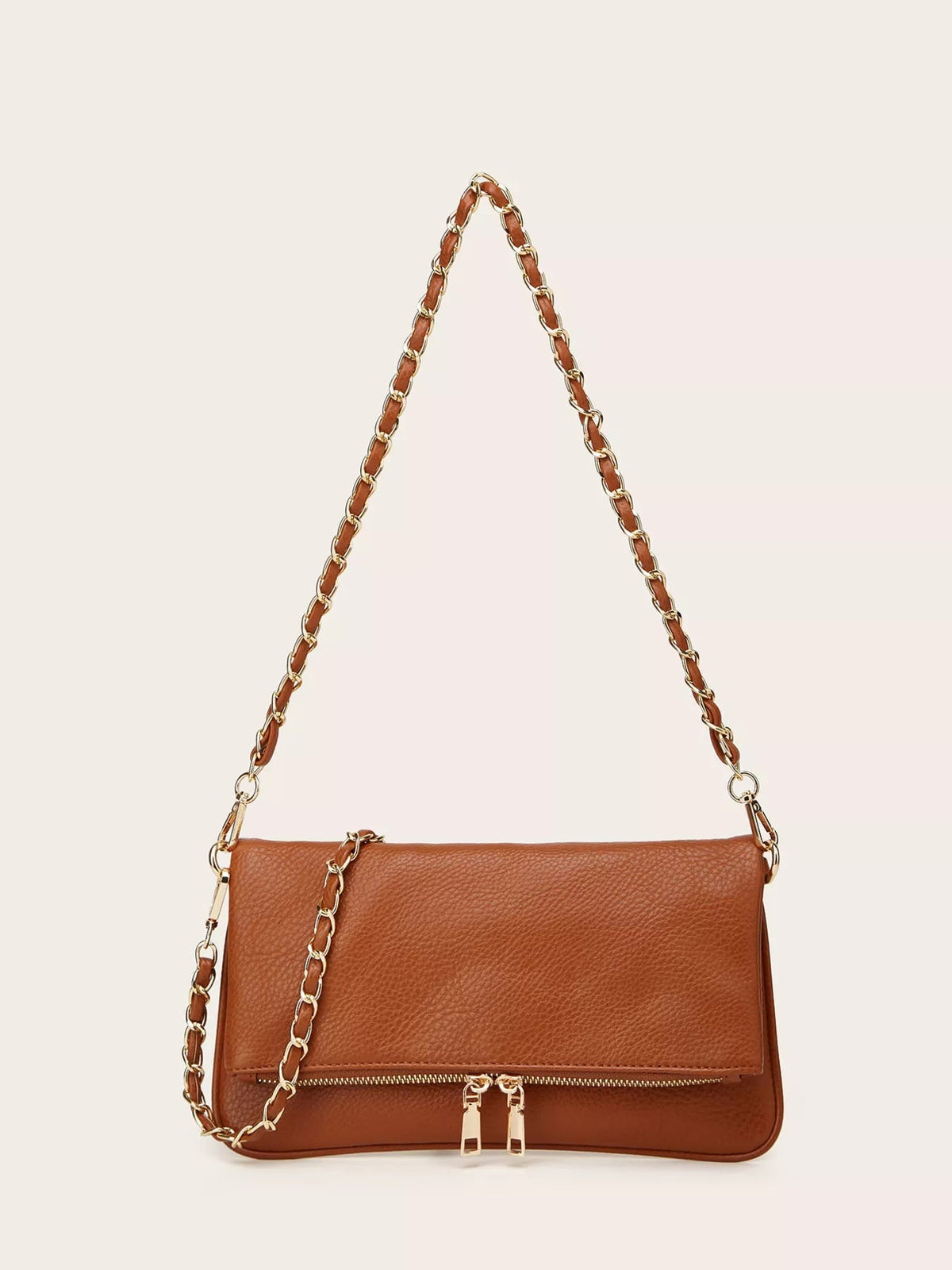 A medium brown PU leather shoulder bag with a rectangular silhouette, flap closure, gold-tone chain strap, and front zip pocket.