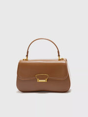 Small brown PU leather crossbody bag with a structured silhouette, top handle, stitched flap closure, and gold-tone clasp hardware.