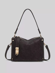 Small black PU leather crossbody bag with an adjustable strap, structured rectangular silhouette, top zipper, and gold-tone hardware details.