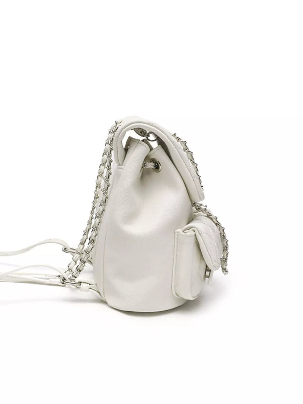 Small white PU leather backpack with a rounded silhouette, twin chain straps, a structured top, and a visible side pocket.