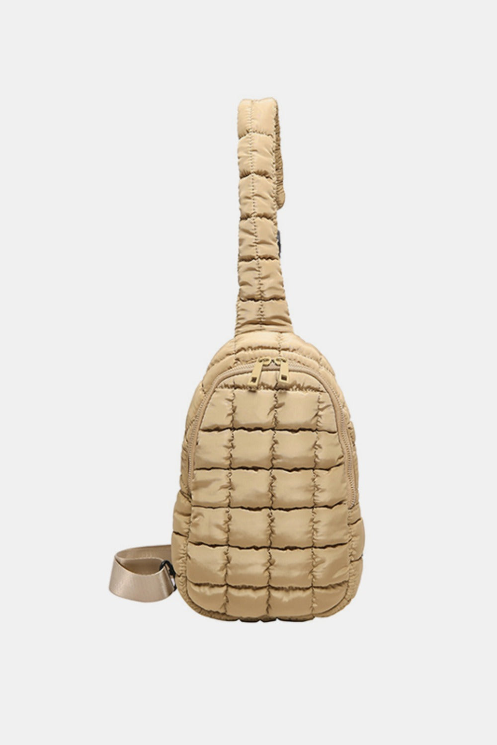 Beige quilted nylon crossbody bag with a softly padded grid pattern, rounded elongated silhouette, zip-around opening, and wide shoulder strap.