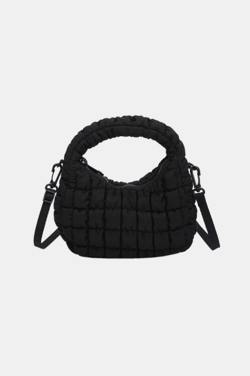 Black quilted puffy crossbody bag with a rounded silhouette, gathered texture, padded top handle, zipper closure, and removable strap.