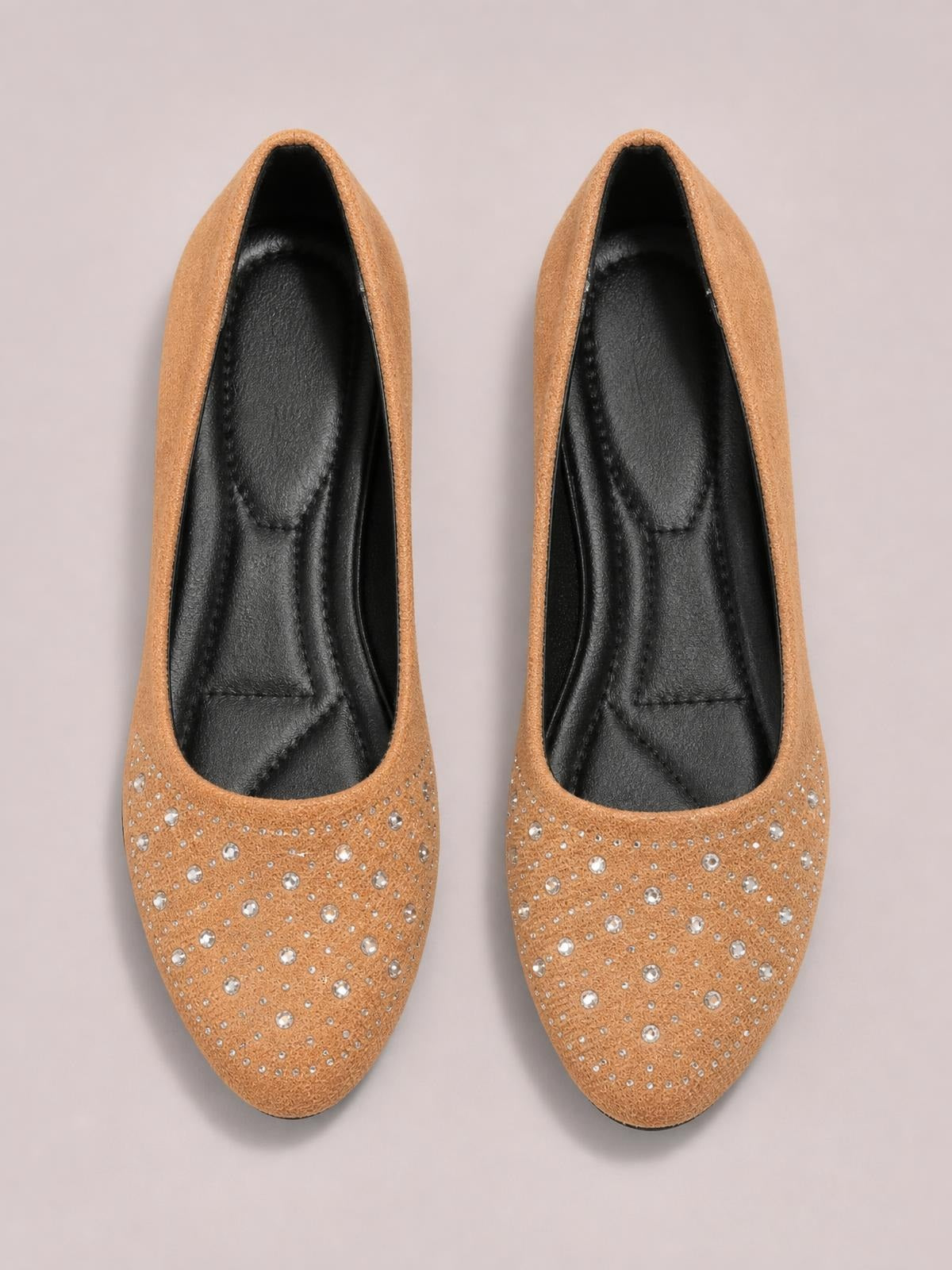 Tan rhinestone flat slip-on shoes with rounded toes, textured PU leather uppers, open vamps, and black cushioned insoles.