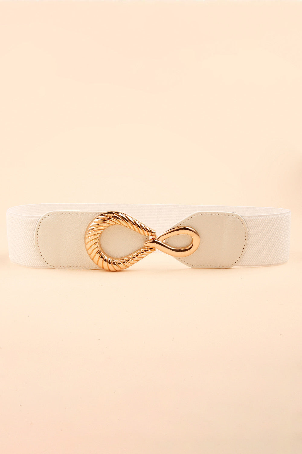 White ribbed elastic belt with a wide PU band, stitched end panels, and a sculptural gold alloy interlocking buckle.