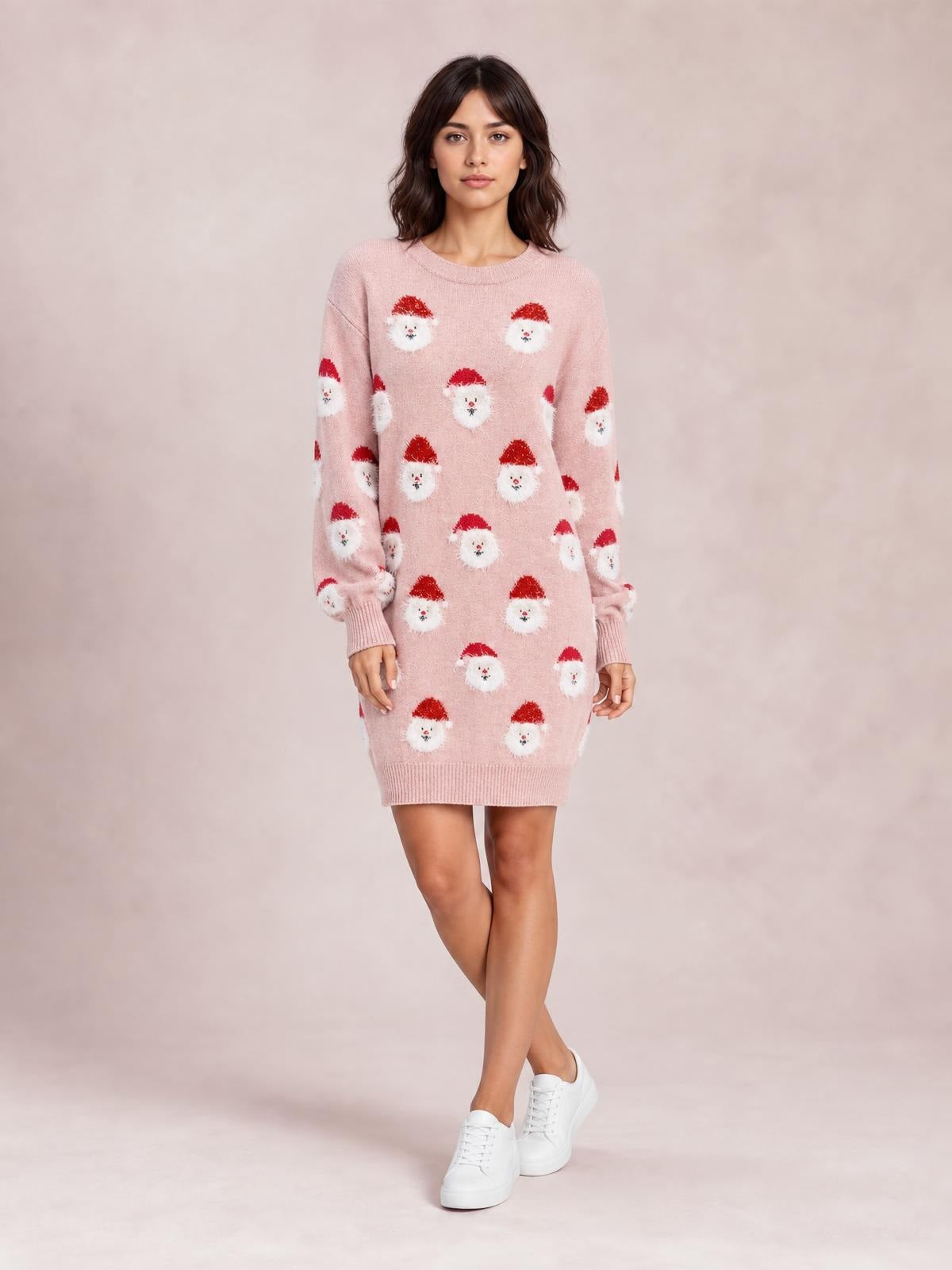 Model wears a pink round-neck dropped-shoulder sweater dress with long sleeves, ribbed cuffs and hem, Santa motifs, and a relaxed straight silhouette.
