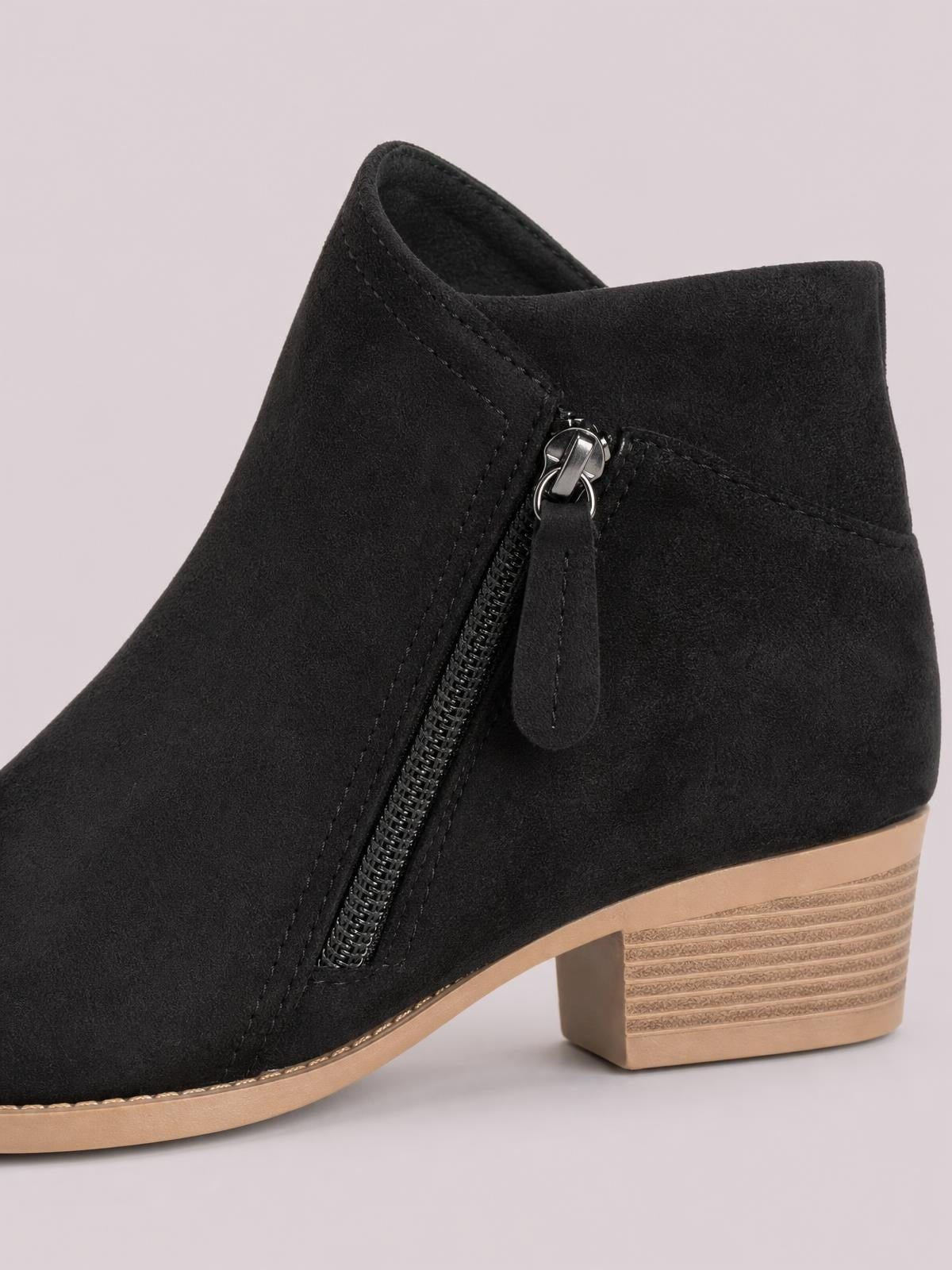 Black round-toe block-heel ankle boot in PU leather with a side zipper, stitched panels, and a low stacked heel.