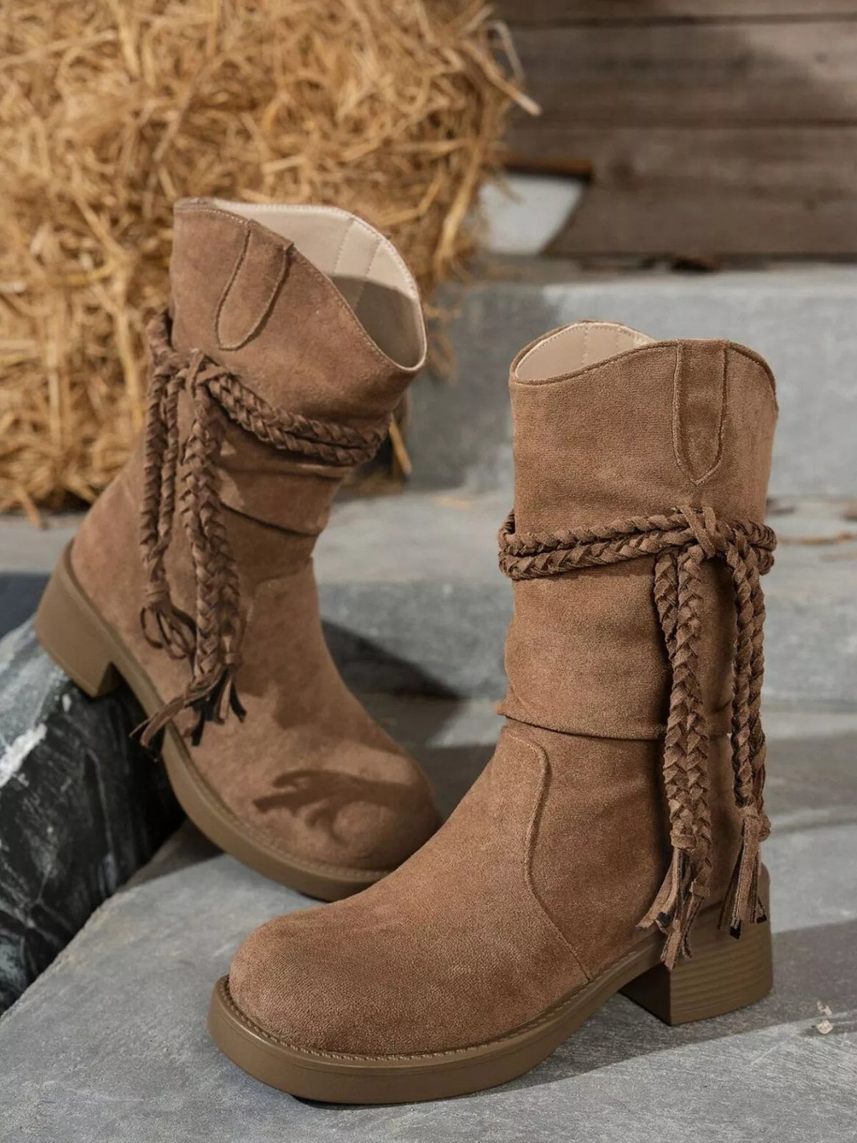 Brown PU leather mid-heel boots with rounded toes, stitched paneling, and braided wraparound ankle laces.