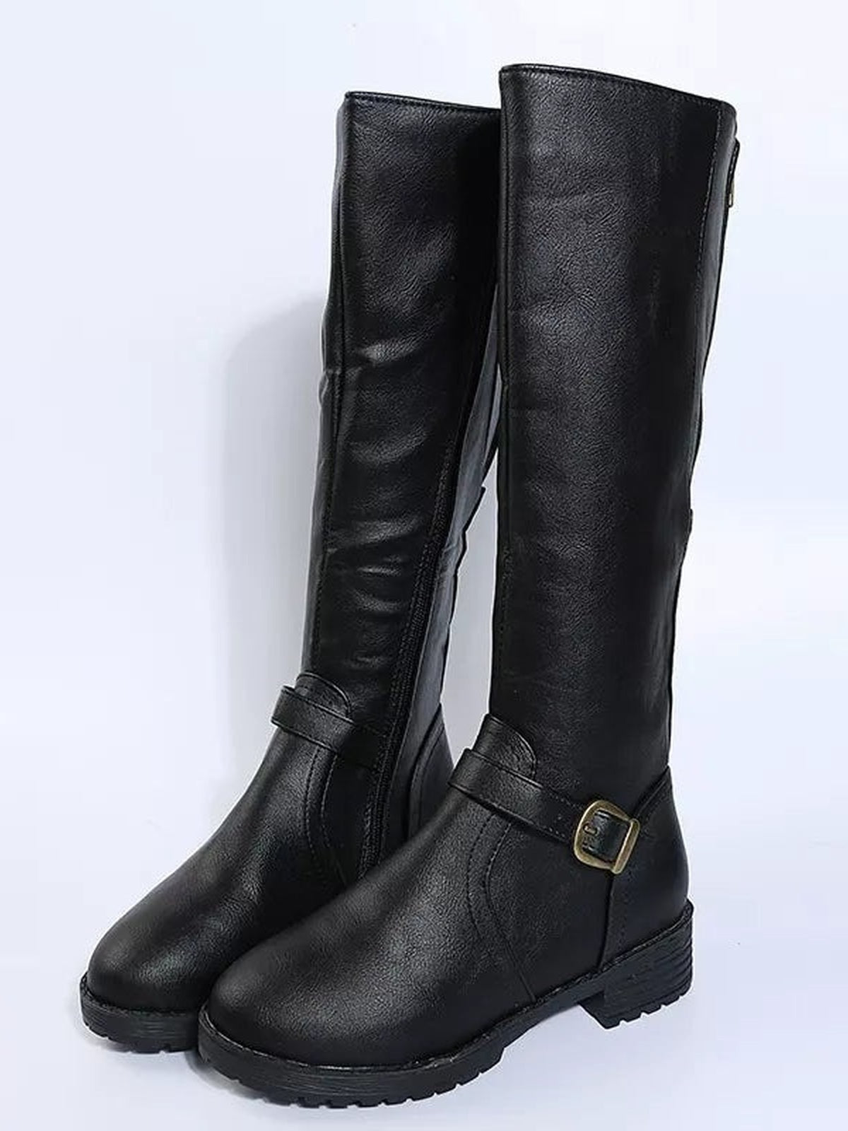 Black PU leather boots feature round toes, tall shafts, low block heels, adjustable buckle straps, stitched panels, and rugged rubber soles.